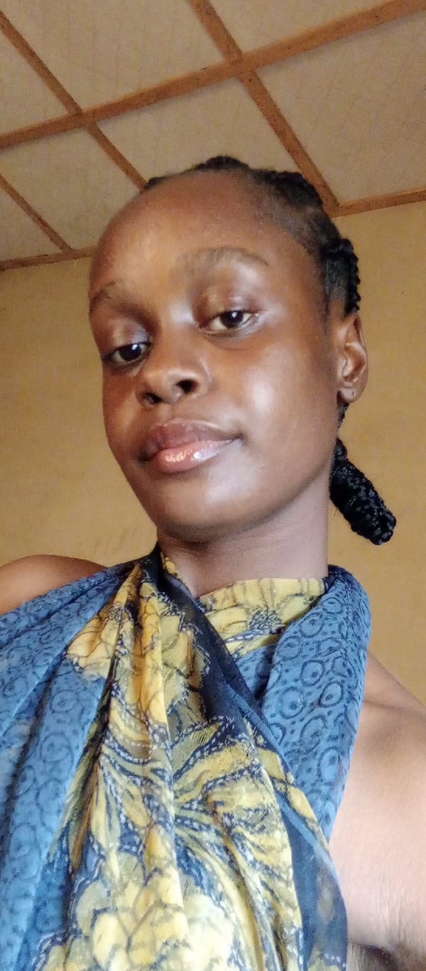 Woman in traditional scarf photographed in Akwanga, Nigeria