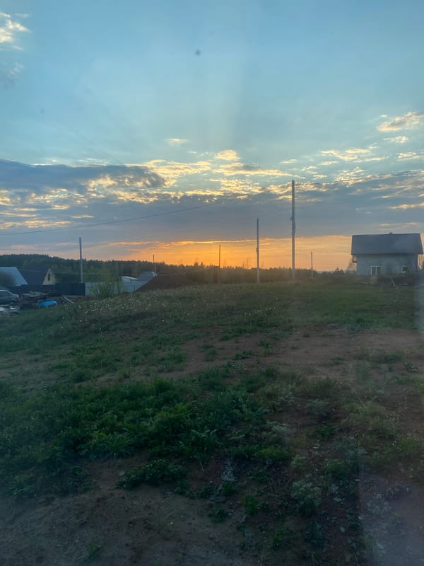 Sunset journey documented across rural Russian landscapes and towns