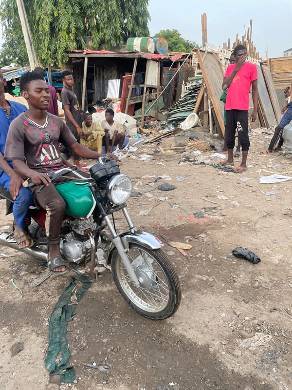 Morning scenes documented in Abuja informal settlement community