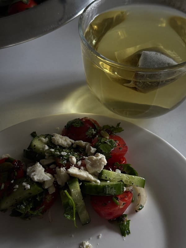 Traditional breakfast documented in Yerevan featuring salad and omelet