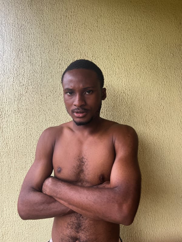 Two people captured in casual indoor moments in Makurdi