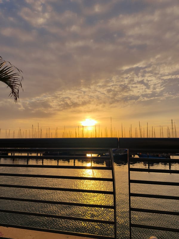 Family dining captured during sunset at Ashkelon marina
