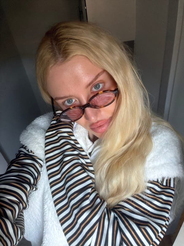 Woman takes bathroom selfie in Belgrade apartment