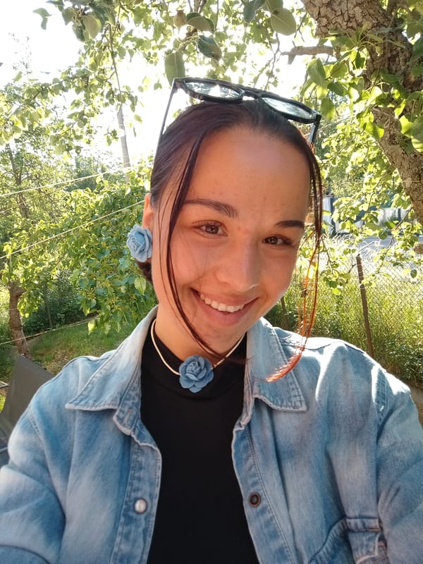 Woman Takes Selfie at Urban Location