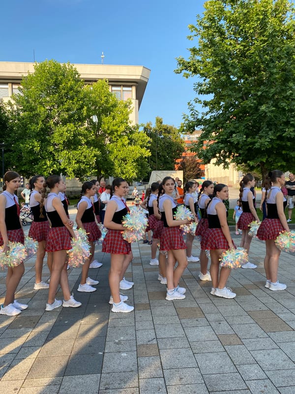 Marching band and cheerleaders perform in downtown Pleven