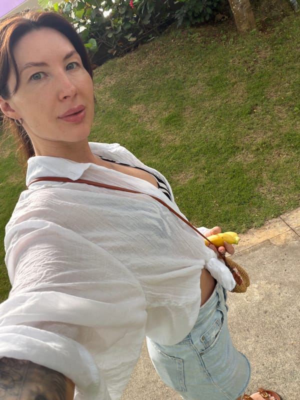 Woman documents Vietnam beach vacation in morning selfie session