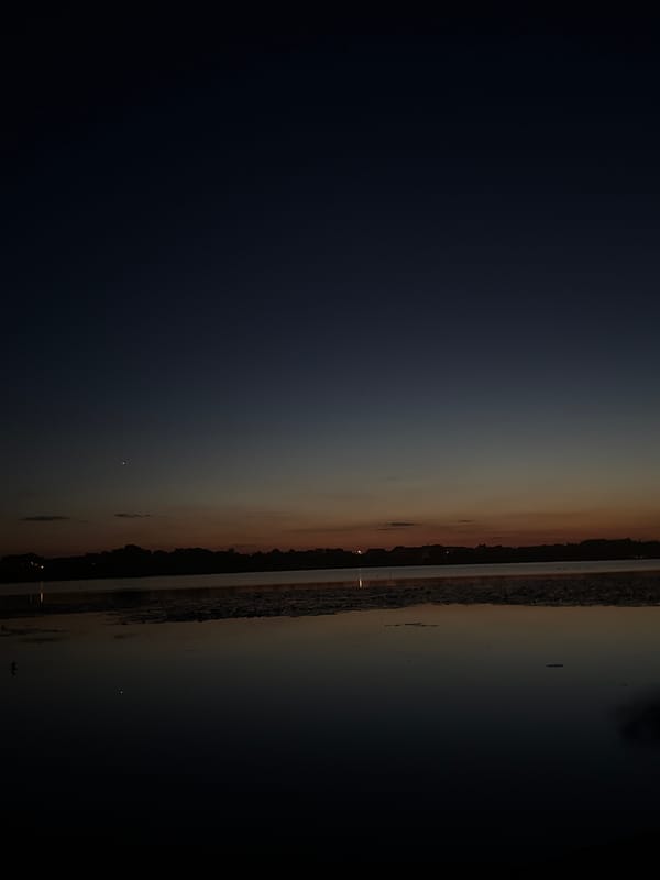 Lakeside evening: dusk on the water and an outdoor hangout