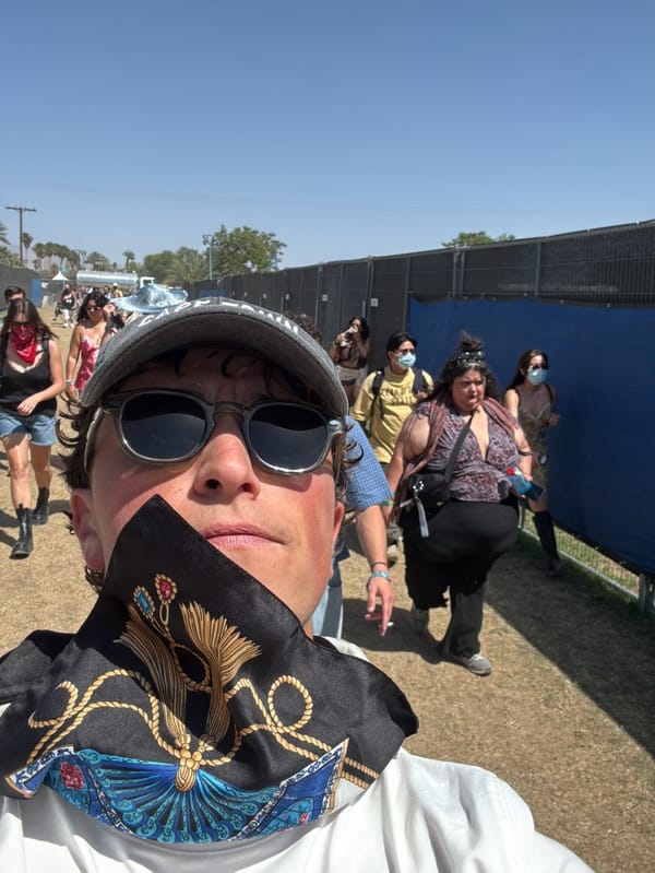 Festival crowds gather along pathway in Indio, California