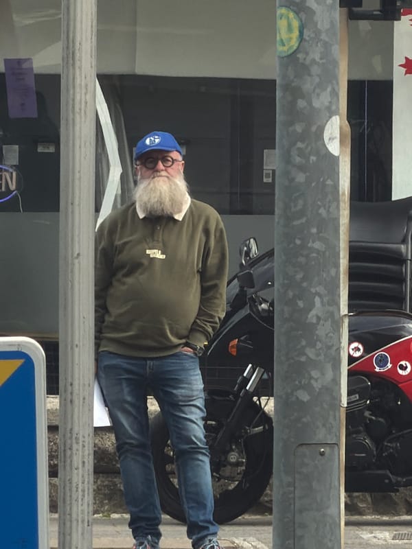 Man with motorcycle observed on Esch-sur-Alzette sidewalk