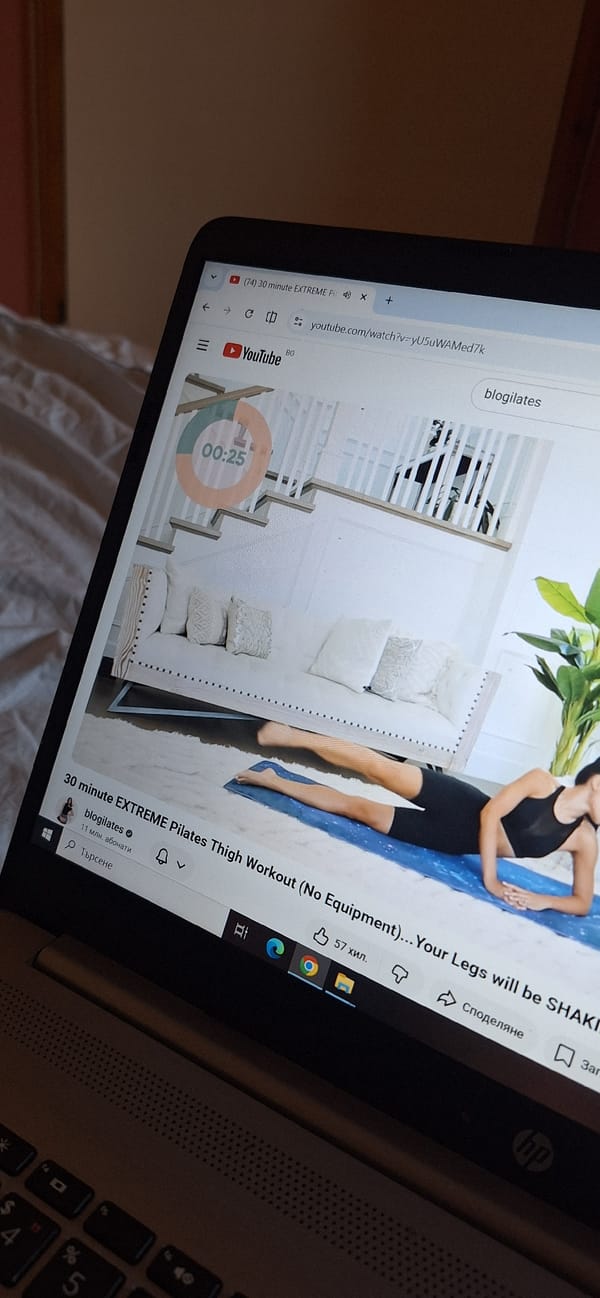 Home Pilates workout session with YouTube guidance