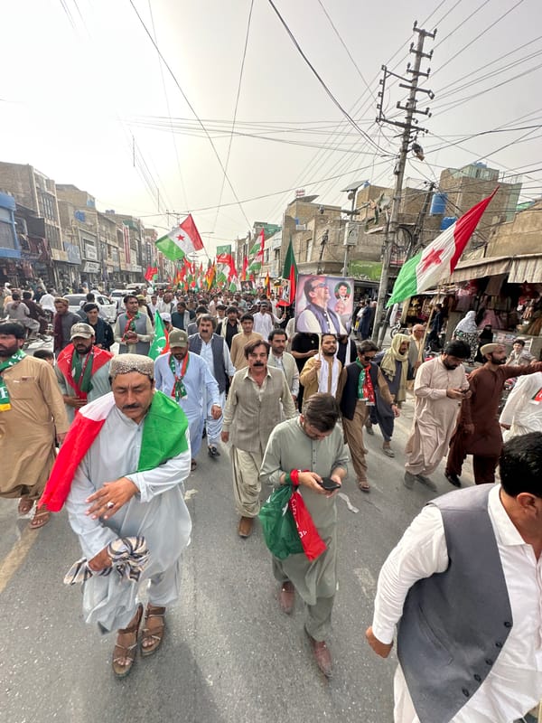 Political march with flags rolls through Quetta streets