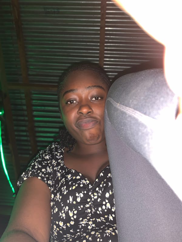 Green-lit nighttime social gathering documented at Nigeria stadium venue