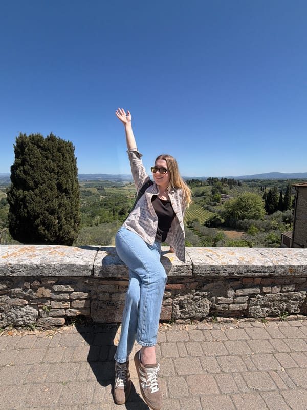 Tourists enjoy afternoon leisure time in historic San Gimignano