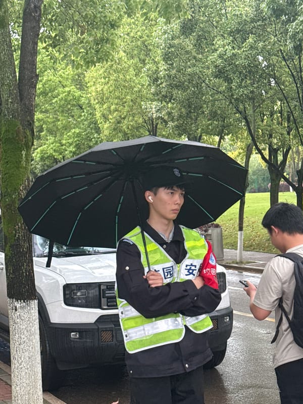 Security guard stationed at building in early morning Jiangjin