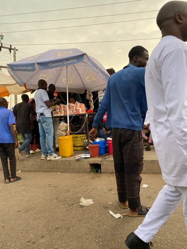 Evening street commerce bustles in Bukuru, Nigeria