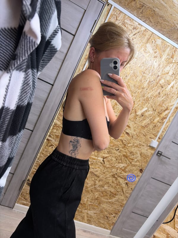 Person takes selfie in fitting room, Chaikovsky, Russia