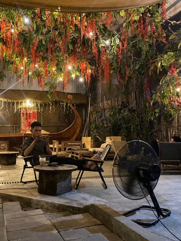 Evening hang at a leafy outdoor café in Nha Trang
