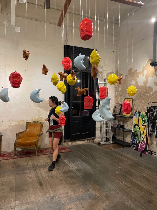 Art gallery with diverse figurative paintings documented in Buenos Aires