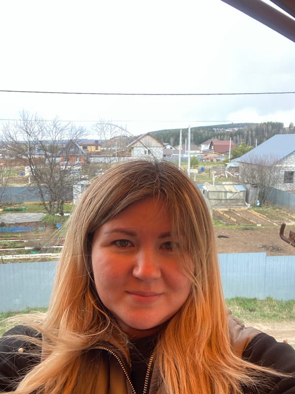 Woman captures quiet rural moments in Ольховка, Russia