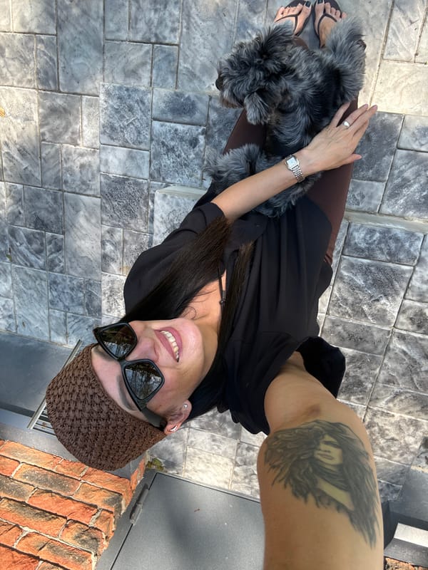 Patio hangout with a fluffy gray dog in Chaikovsky