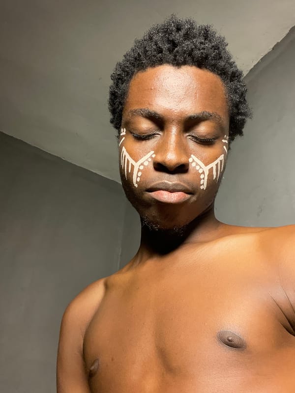 White tribal face paint on display at a Nkpor gathering