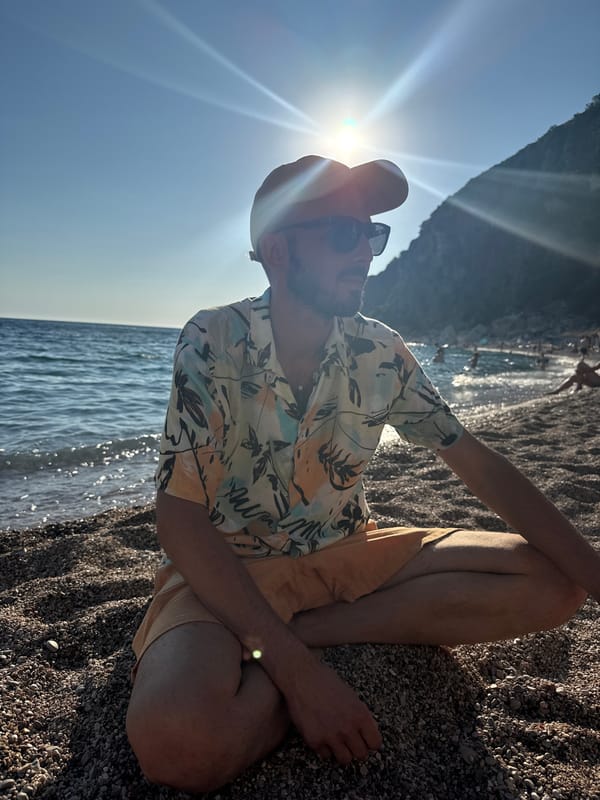 A relaxed afternoon on a pebble beach at sunset