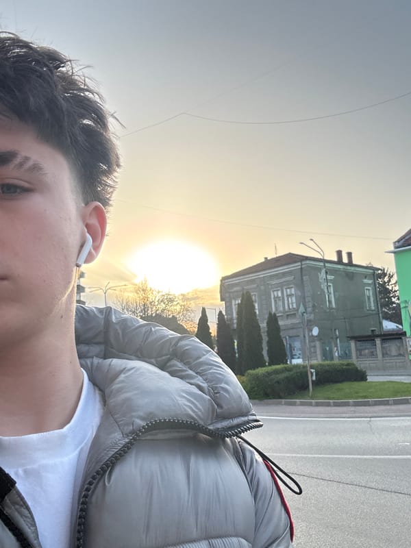 Person spotted on Sevlievo sidewalk amid urban rooftops