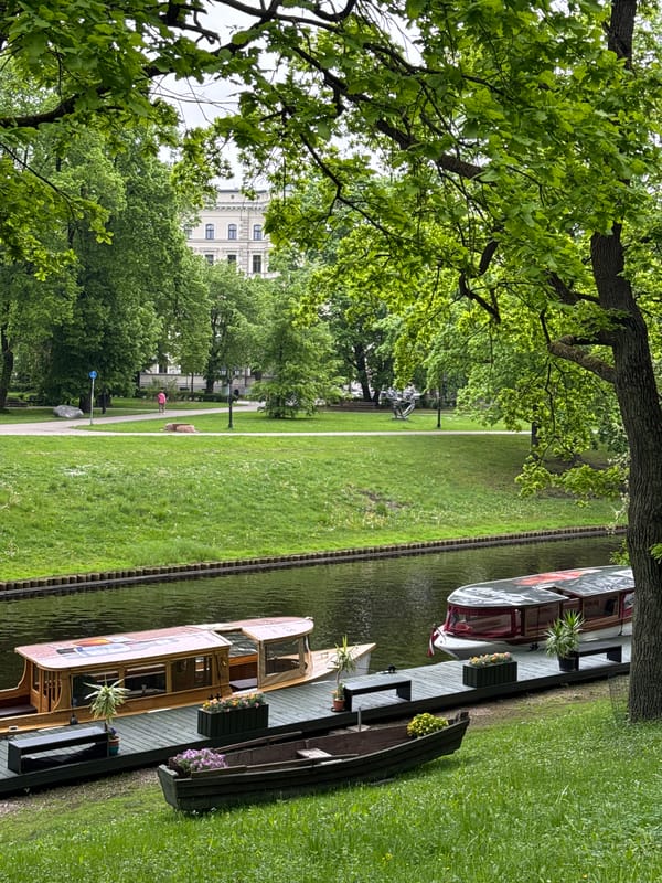 Morning stroll captures Riga's scenic canals, boats, fountains