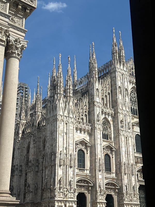 Tourist documents Milan cathedral and historic gallery visit