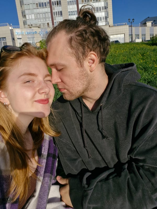 Couple enjoys sunny afternoon by Yekaterinburg waterfront