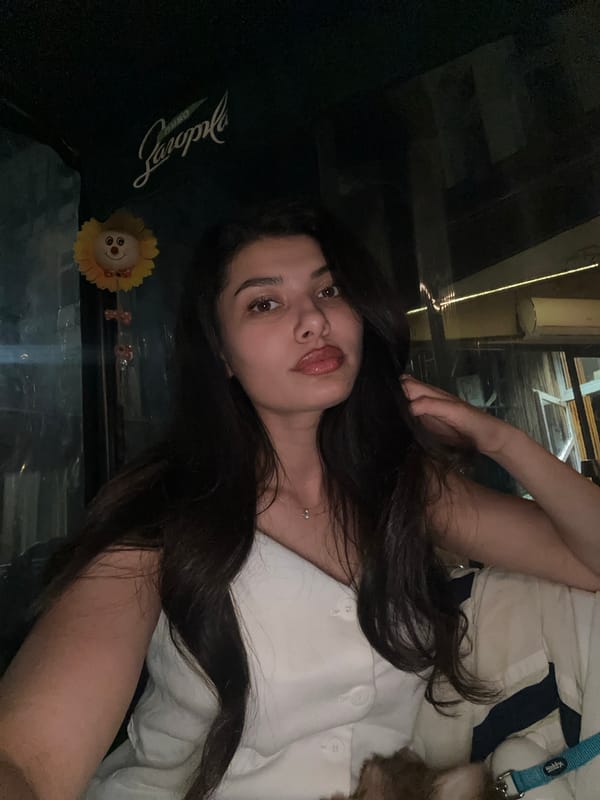 Woman takes selfie with sleeping dog in Bulgaria