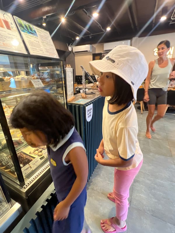 Family browses desserts at Baan Lamai cafe