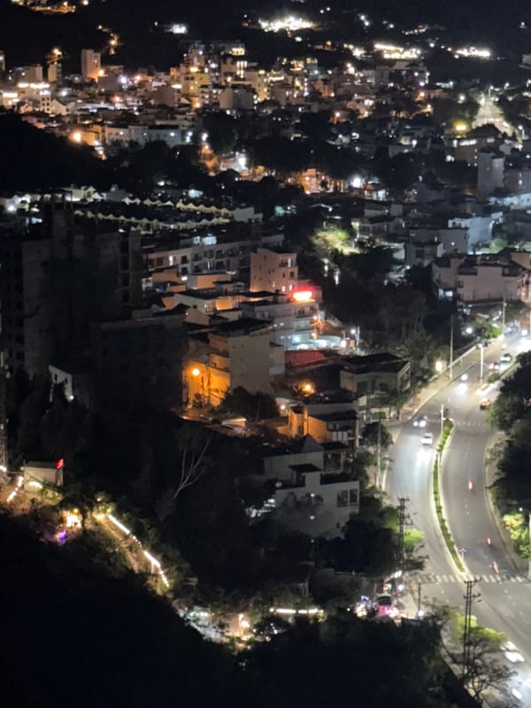 Nha Trang at night, from above, city lights and crescent moon