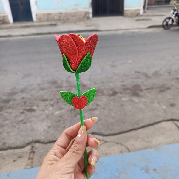 Glittery decorative roses displayed during celebration in Juan Griego