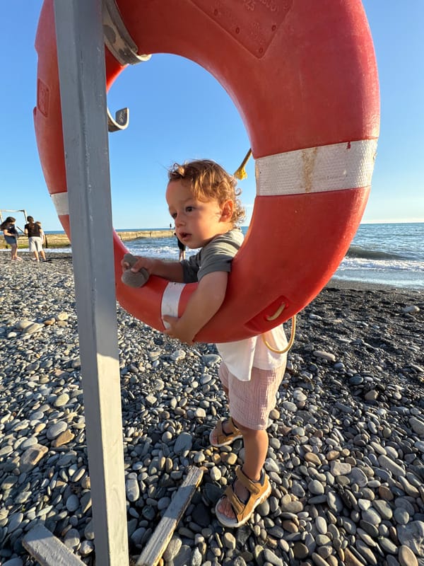 Family beach day in Sochi with swimming and seaside activities