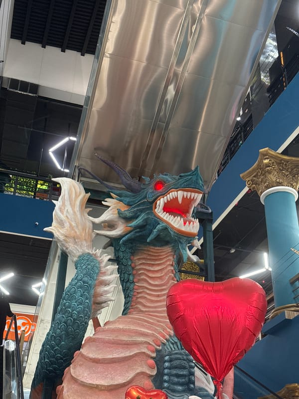 Dragon art installation with koi pond documented in Nakhodka