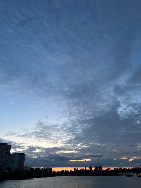Twilight settles over the Dnipro River in Kyiv