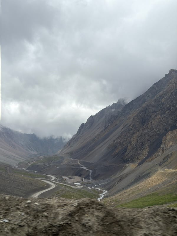 Sprinter van parked deep in a remote Kyrgyz mountain valley