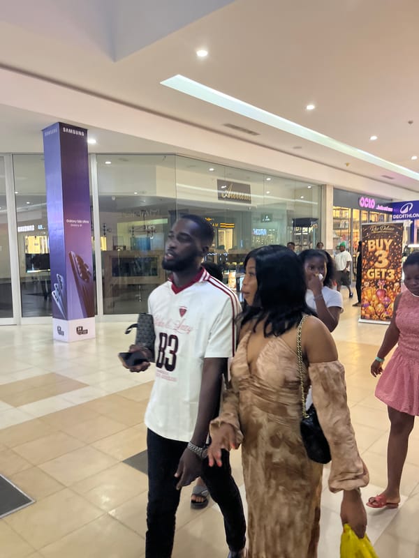 Nighttime community gathering features roller skating at Accra basketball court