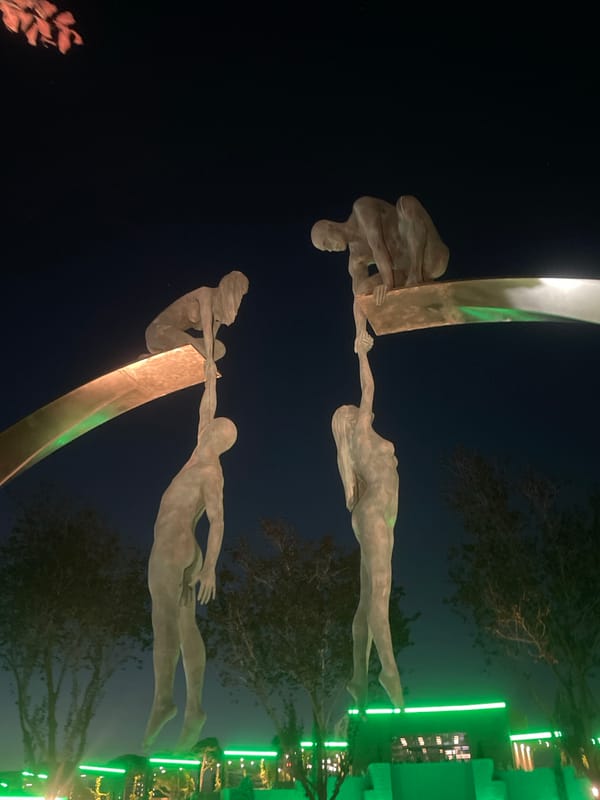 Krasnodar public plaza lit up at night with red light installations