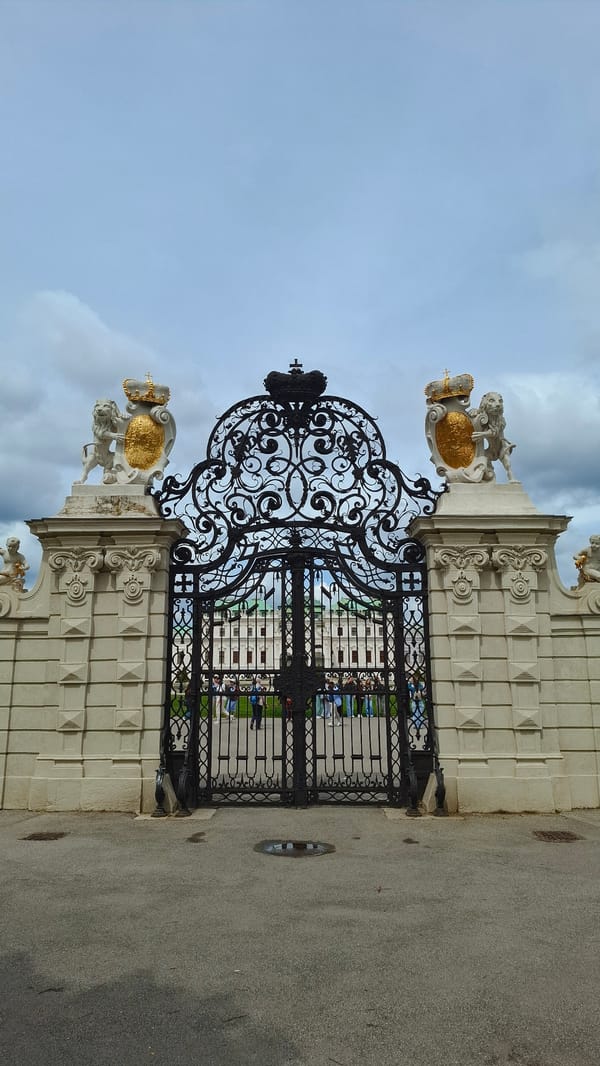 Tourist captures Vienna palace architecture during morning visit