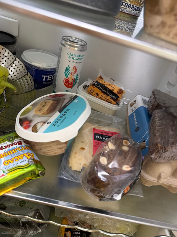 Fridge contents and a green '#oink' graphic, Moscow