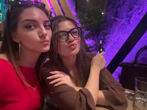 Two women pose for photo at Sofia restaurant