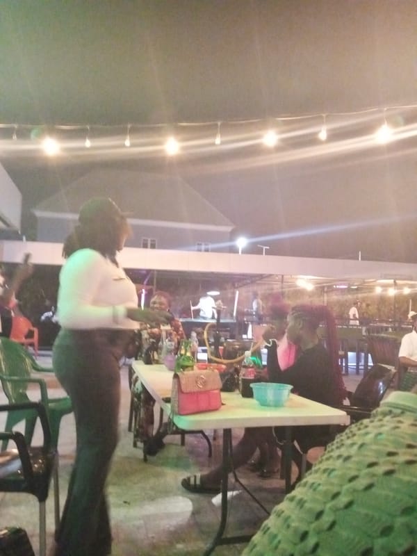 Evening social gathering with drinks observed in Adankolo, Nigeria
