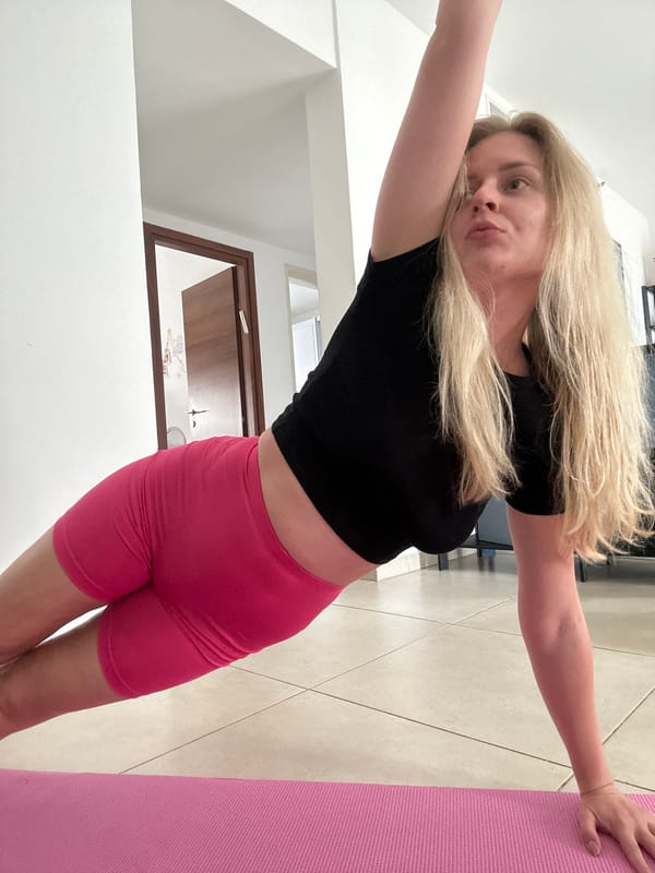 Woman practices yoga indoors in Petah Tikva, Israel