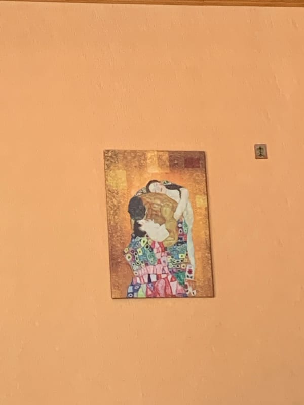 Art studio session with portrait sketches and Klimt reproduction
