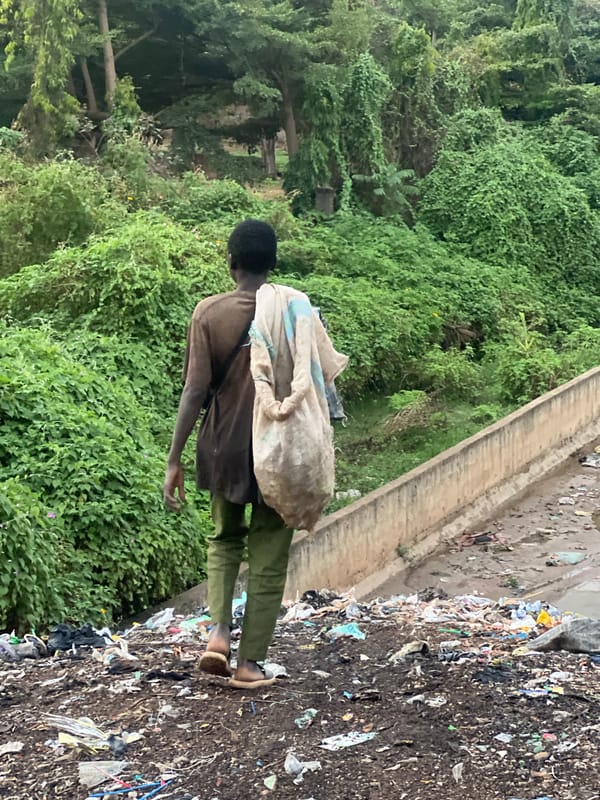 Person with bag observed at Gura Top garbage dump