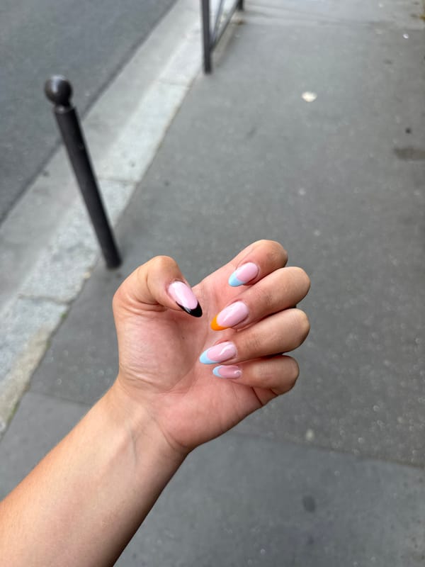 Selfie and nail close-up near the Eiffel Tower, Paris