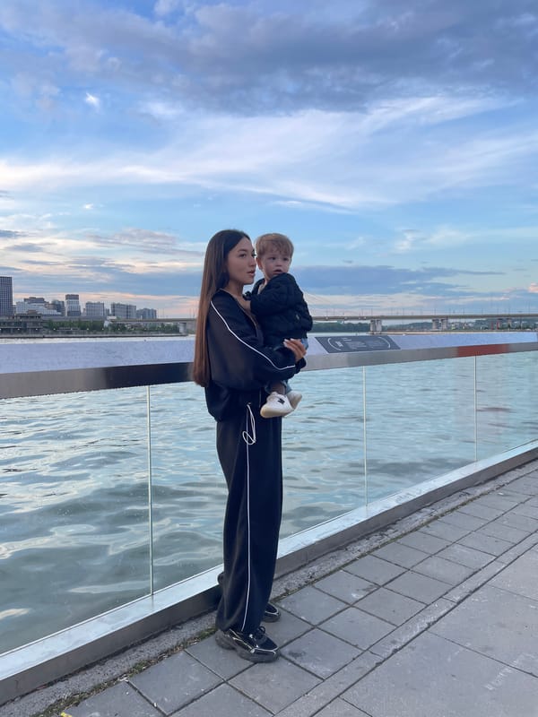 Families enjoy evening leisure activities along Kazan riverfront