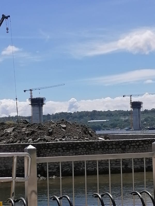 Bridge construction continues in Davao City with multiple cranes